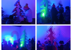 Dzieci wypełniają choinkę piłeczkami