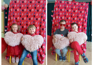 Dzieci z grupy II pozują do walentynkowego zdjęcia